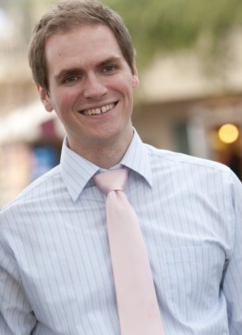 Headshot of Dr. James Grand